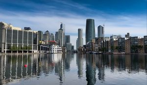 Preview wallpaper skyscrapers, buildings, water, reflection, city