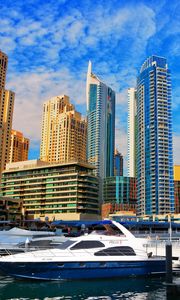 Preview wallpaper skyscrapers, buildings, yachts, pier, city