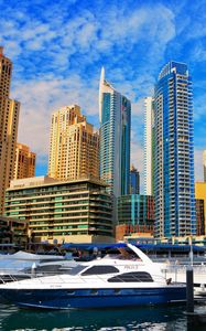 Preview wallpaper skyscrapers, buildings, yachts, pier, city