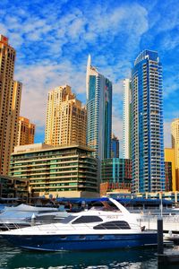 Preview wallpaper skyscrapers, buildings, yachts, pier, city