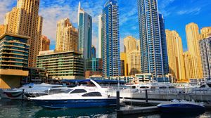Preview wallpaper skyscrapers, buildings, yachts, pier, city