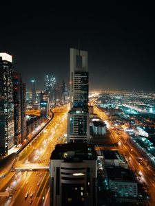 Preview wallpaper skyscrapers, city, aerial view, night, buildings, lights