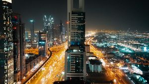 Preview wallpaper skyscrapers, city, aerial view, night, buildings, lights