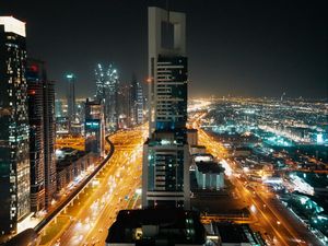 Preview wallpaper skyscrapers, city, aerial view, night, buildings, lights