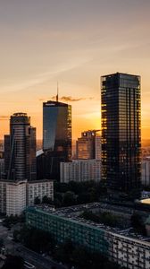 Preview wallpaper skyscrapers, city, aerial view, sunset, buildings