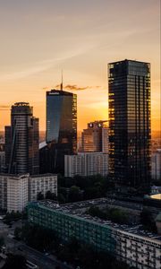Preview wallpaper skyscrapers, city, aerial view, sunset, buildings