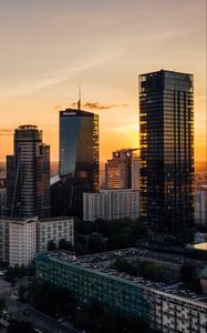 Preview wallpaper skyscrapers, city, aerial view, sunset, buildings