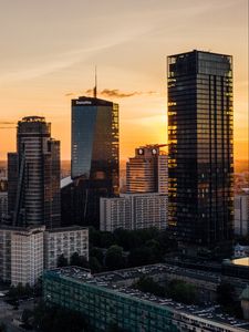 Preview wallpaper skyscrapers, city, aerial view, sunset, buildings