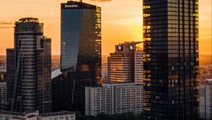Preview wallpaper skyscrapers, city, aerial view, sunset, buildings