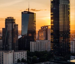 Preview wallpaper skyscrapers, city, aerial view, sunset, buildings