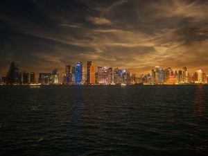 Preview wallpaper skyscrapers, city, lights, night, sea, doha, qatar