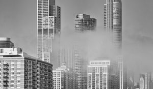 Preview wallpaper skyscrapers, fog, bridge, city, black and white