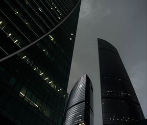 Preview wallpaper skyscrapers, lights, buildings, night, city, bottom view