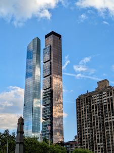 Preview wallpaper skyscrapers, mirrored, buildings, sky