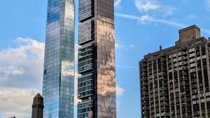 Preview wallpaper skyscrapers, mirrored, buildings, sky