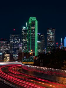 Preview wallpaper skyscrapers, neon, road, long exposure, city, lights