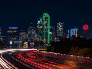 Preview wallpaper skyscrapers, neon, road, long exposure, city, lights