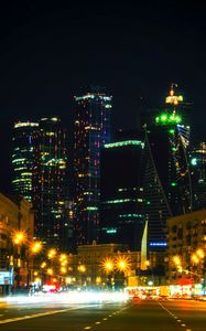 Preview wallpaper skyscrapers, night city, architecture, city lights, moscow, russia