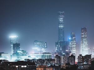 Preview wallpaper skyscrapers, night city, buildings, glow, night