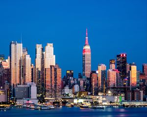 Preview wallpaper skyscrapers, night, pier, ships, city