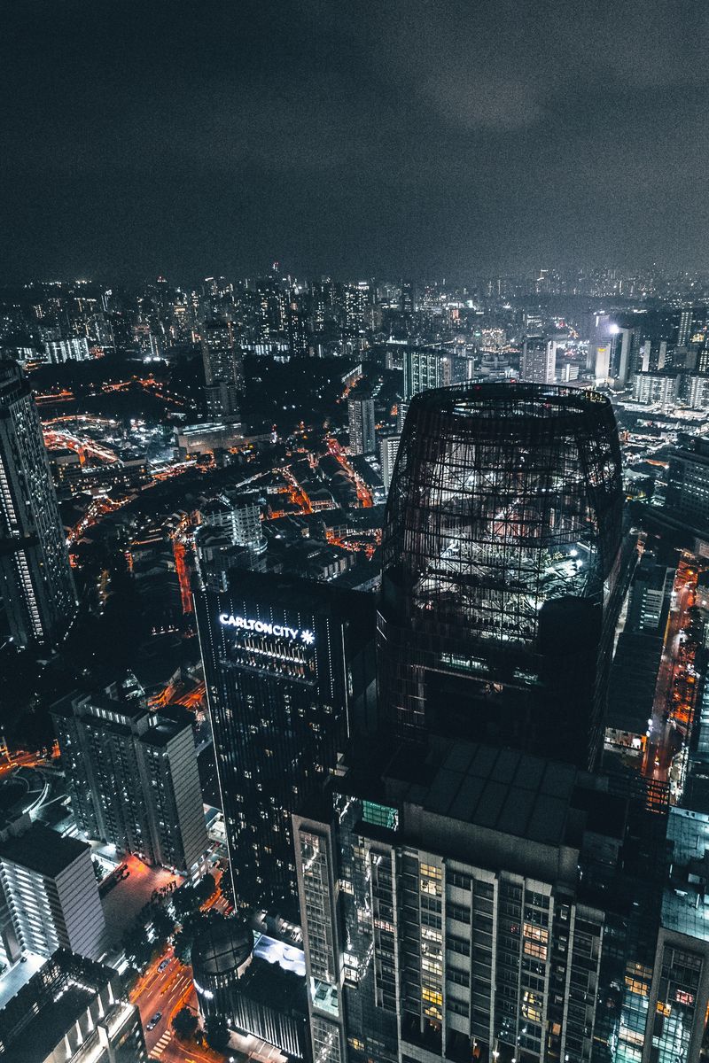 Download wallpaper 800x1200 skyscrapers, night, top view, city lights ...