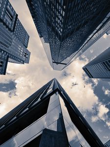 Preview wallpaper skyscrapers, sky, clouds, buildings, bottom view