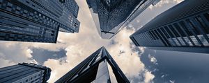 Preview wallpaper skyscrapers, sky, clouds, buildings, bottom view