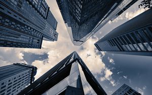 Preview wallpaper skyscrapers, sky, clouds, buildings, bottom view