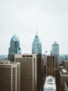 Preview wallpaper skyscrapers, towers, buildings, drops, blur