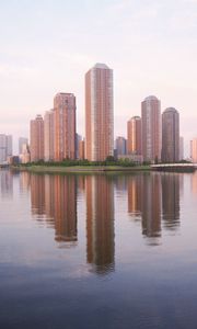 Preview wallpaper skyscrapers, water, reflection, city