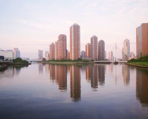 Preview wallpaper skyscrapers, water, reflection, city