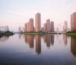 Preview wallpaper skyscrapers, water, reflection, city