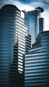 Preview wallpaper skyscrapers, windows, mirror, clouds, sky, city