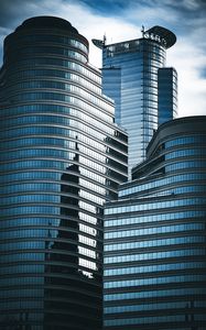 Preview wallpaper skyscrapers, windows, mirror, clouds, sky, city