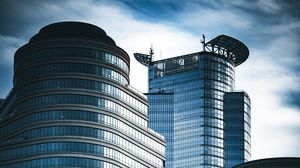 Preview wallpaper skyscrapers, windows, mirror, clouds, sky, city