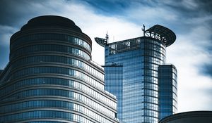 Preview wallpaper skyscrapers, windows, mirror, clouds, sky, city