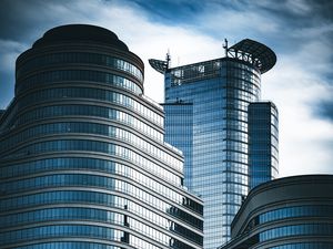 Preview wallpaper skyscrapers, windows, mirror, clouds, sky, city