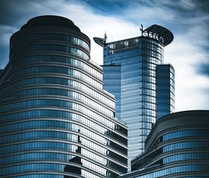 Preview wallpaper skyscrapers, windows, mirror, clouds, sky, city