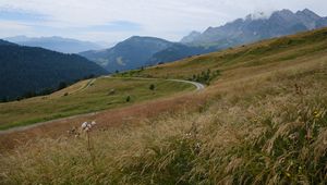 Preview wallpaper slope, field, path, mountains, fog, sky