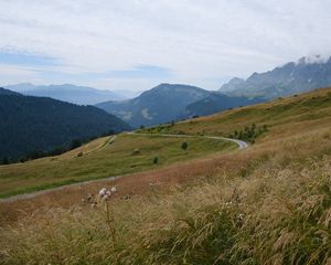 Preview wallpaper slope, field, path, mountains, fog, sky