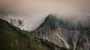 Preview wallpaper slope, fog, mountains, trees, rocks
