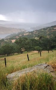 Preview wallpaper slope, grass, field, river, mountains, landscape