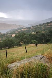 Preview wallpaper slope, grass, field, river, mountains, landscape