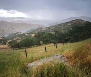 Preview wallpaper slope, grass, field, river, mountains, landscape