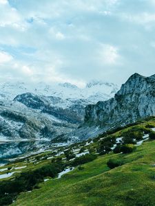 Preview wallpaper slope, grass, snow, peaks