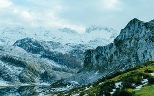 Preview wallpaper slope, grass, snow, peaks