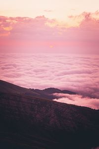 Preview wallpaper slope, hill, clouds, sunset, pink