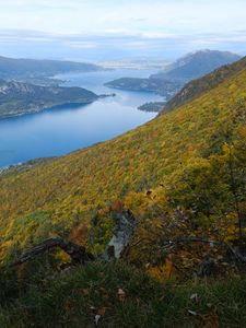Preview wallpaper slope, hills, trees, lake