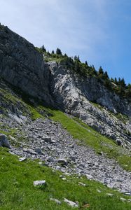 Preview wallpaper slope, mountain, relief, grass, stones