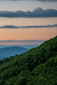 Preview wallpaper slope, mountains, trees, sky